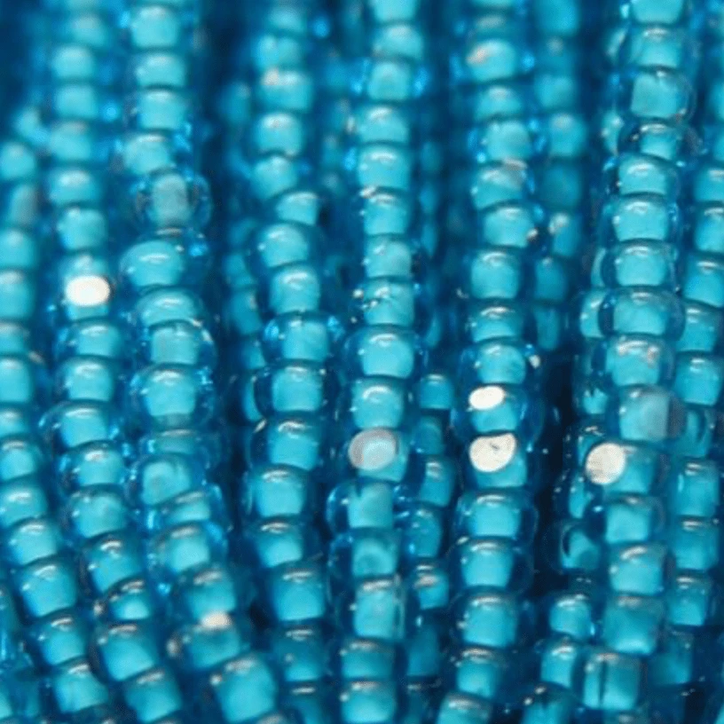 11/0 Charlotte Cut Seed Bead- White Colour Lined Dark Aqua Blue *10g Hank* Charlotte Cut Seedbeads