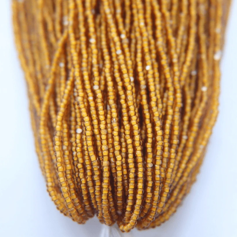 11/0 Charlotte Cut Seed Bead- White Colour Lined Smoked Topaz *10g Hank* Charlotte Cut Seedbeads