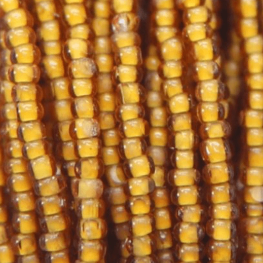 11/0 Charlotte Cut Seed Bead- White Colour Lined Smoked Topaz *10g Hank* Charlotte Cut Seedbeads