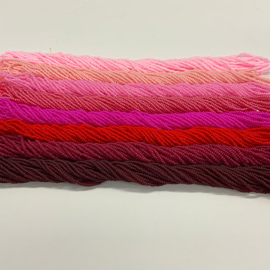Stack of colorfu beads on a white background