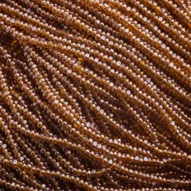 13/0 Charlotte Cut Czech Seed Bead - Transparent Dark Topaz Luster (Short Hank) Czech Preciosa Charlotte Cut Seedbeads