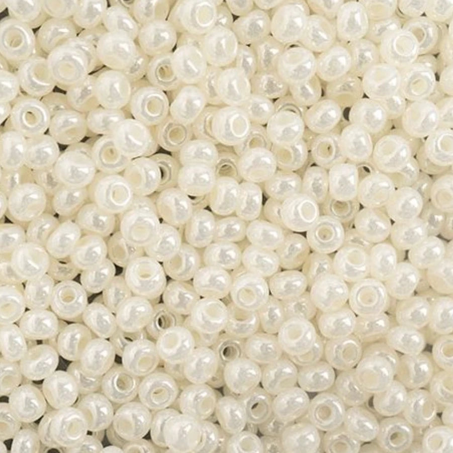 Close-up of small white beads