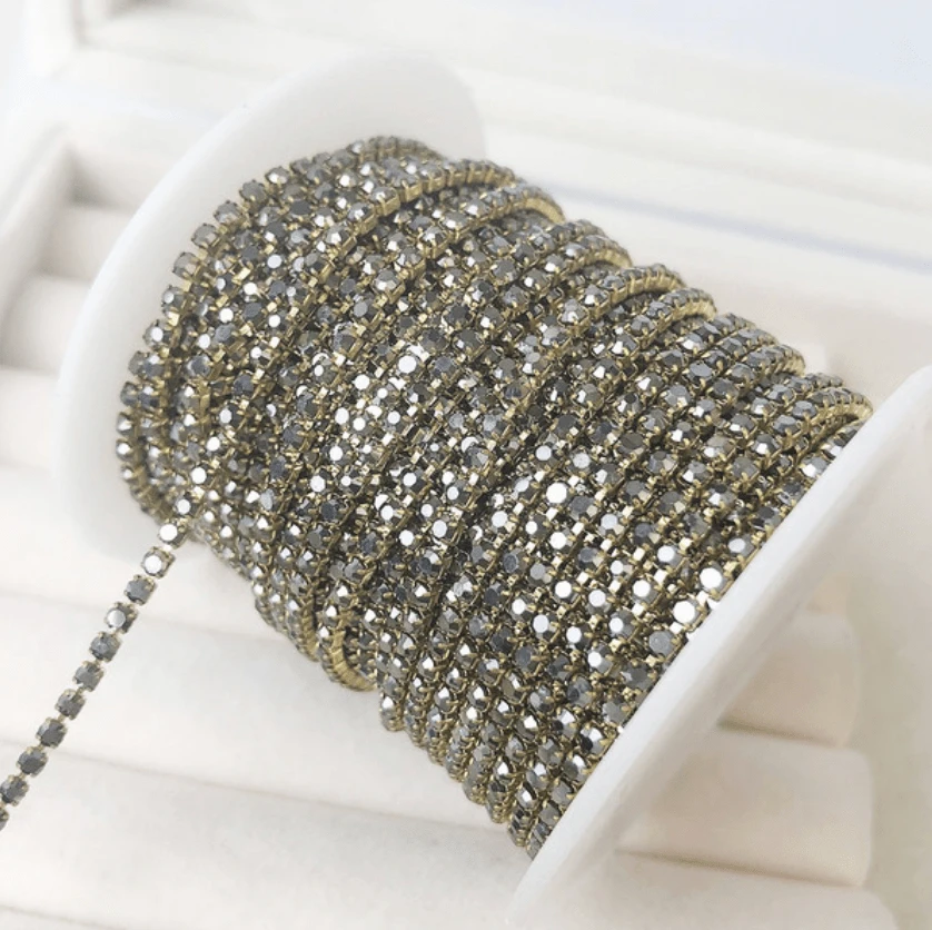 Ss6 Gunmetal Metallic Grey Stones on Gold Metal Rhinestone Chain (Sold in yard) SS6 Metal Rhinestone Chain