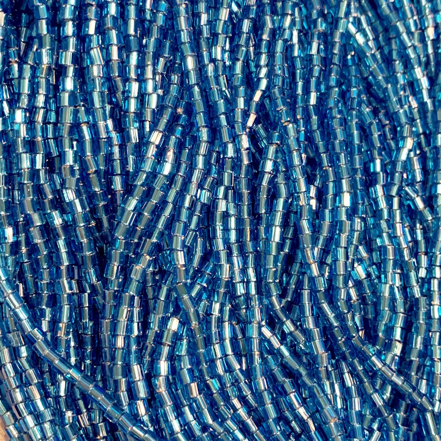 Preciosa Ornela 2-Cut Beads 10/0 2-Cut Beads, Silver Lined Aqua *Sold in Hank