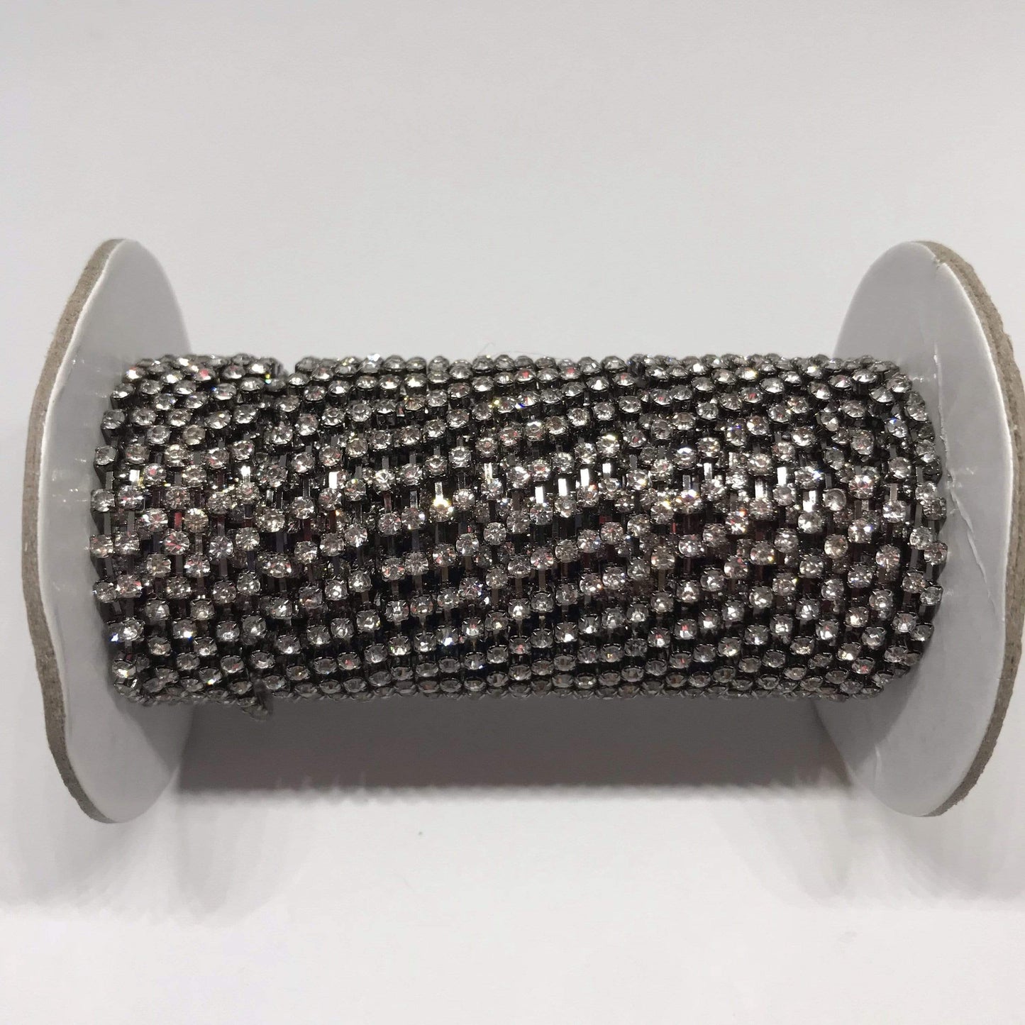 Sundaylace Creations & Bling SS6 Metal Rhinestone Chain Ss6 Clear Stone Gunmetal Metal Rhinestone Chain, Sold per yard