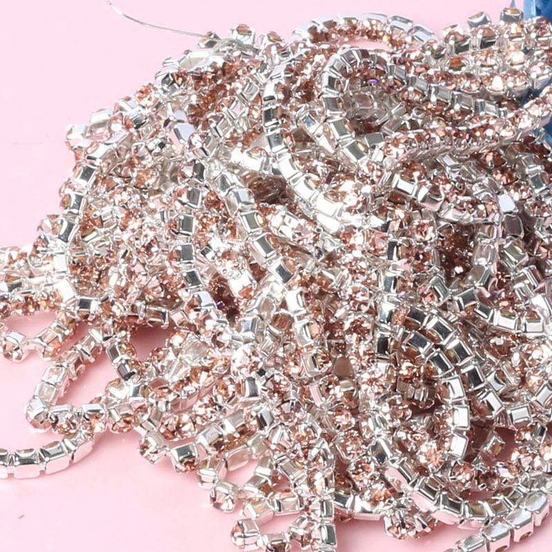 Sundaylace Creations & Bling SS6 Metal Rhinestone Chain Ss6 Silver Ss6 & Ss8 Metal Rhinestone Chain: Silk Champagne, Sold by yard
