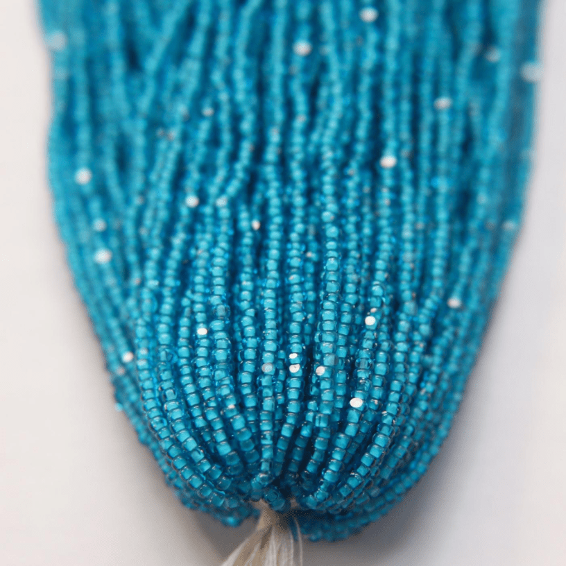 11/0 Charlotte Cut Seed Bead- White Colour Lined Dark Aqua Blue *10g Hank* Charlotte Cut Seedbeads