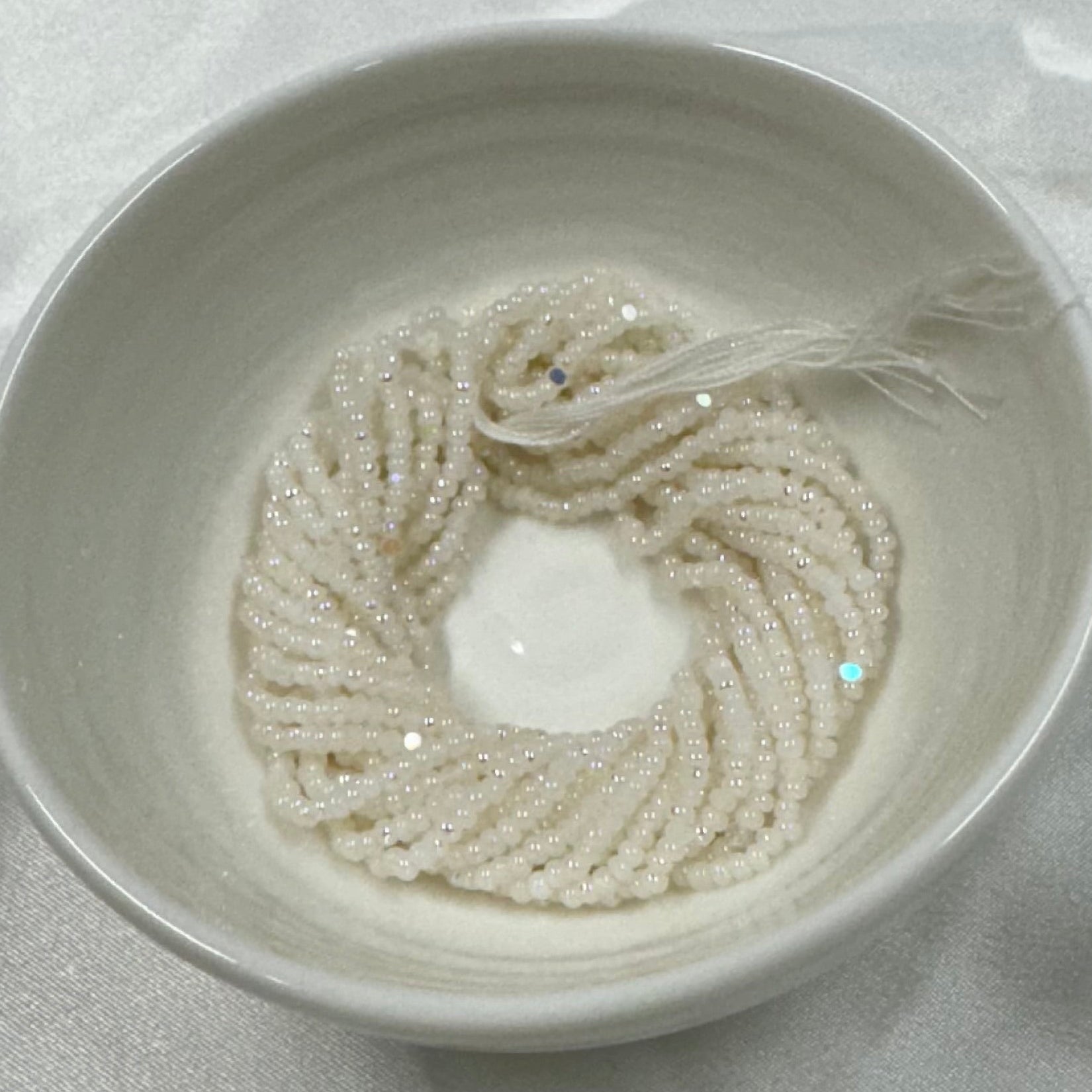 11/0 Charlotte Cut *Premium Seed Bead- Opaque Patina White Alabaster Aurore Boreale  (AB) *10g Hank* India Sheen Charlotte Cut Seedbeads