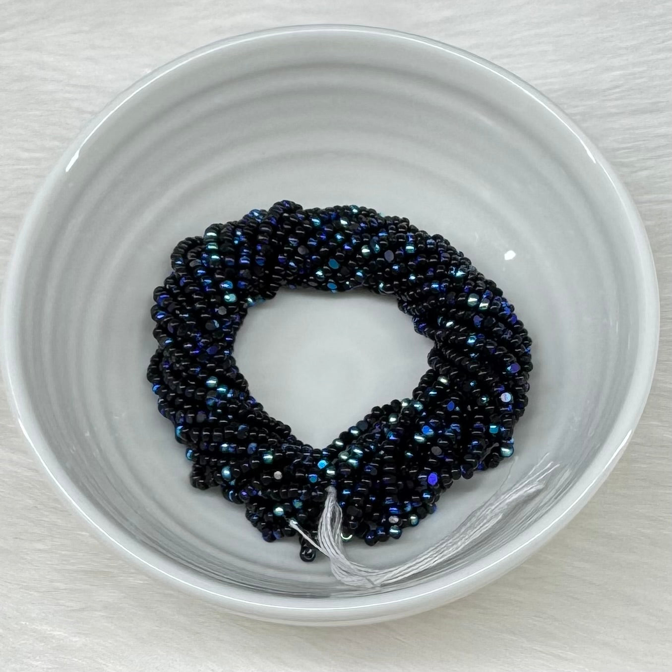 11/0 Charlotte Cut *Premium Seed Bead- Opaque Jet Black Aurore Boreale  (AB) *10g Hank* India Sheen Charlotte Cut Seedbeads
