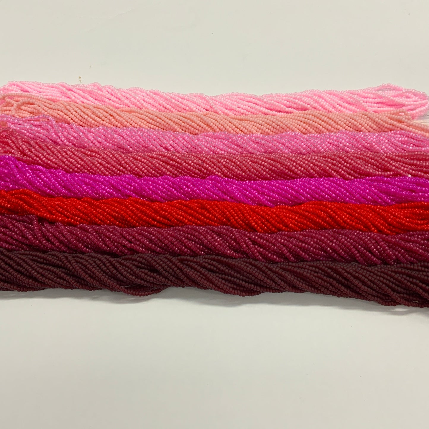 Stack of colorfu beads on a white background