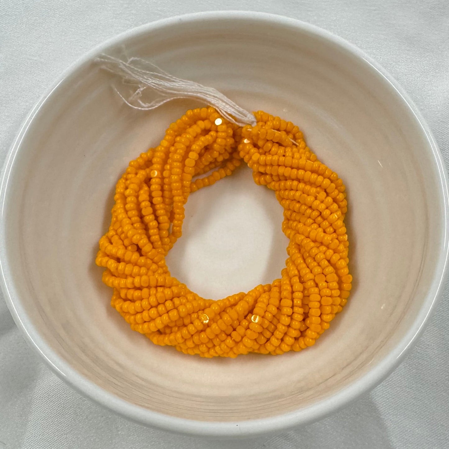 11/0 Charlotte Cut Seed Bead- Opaque Light Orange  *10g Hank* India Sheen Charlotte Cut Seedbeads