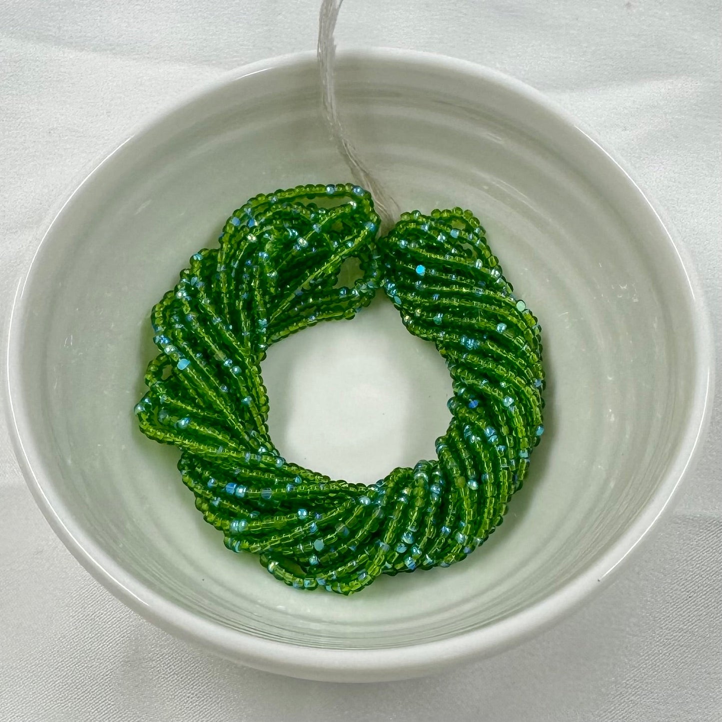 11/0 Charlotte Cut Seed Bead - Transparent Patina Kelly Green AB  (10g) India Sheen Charlotte Cut Seedbeads