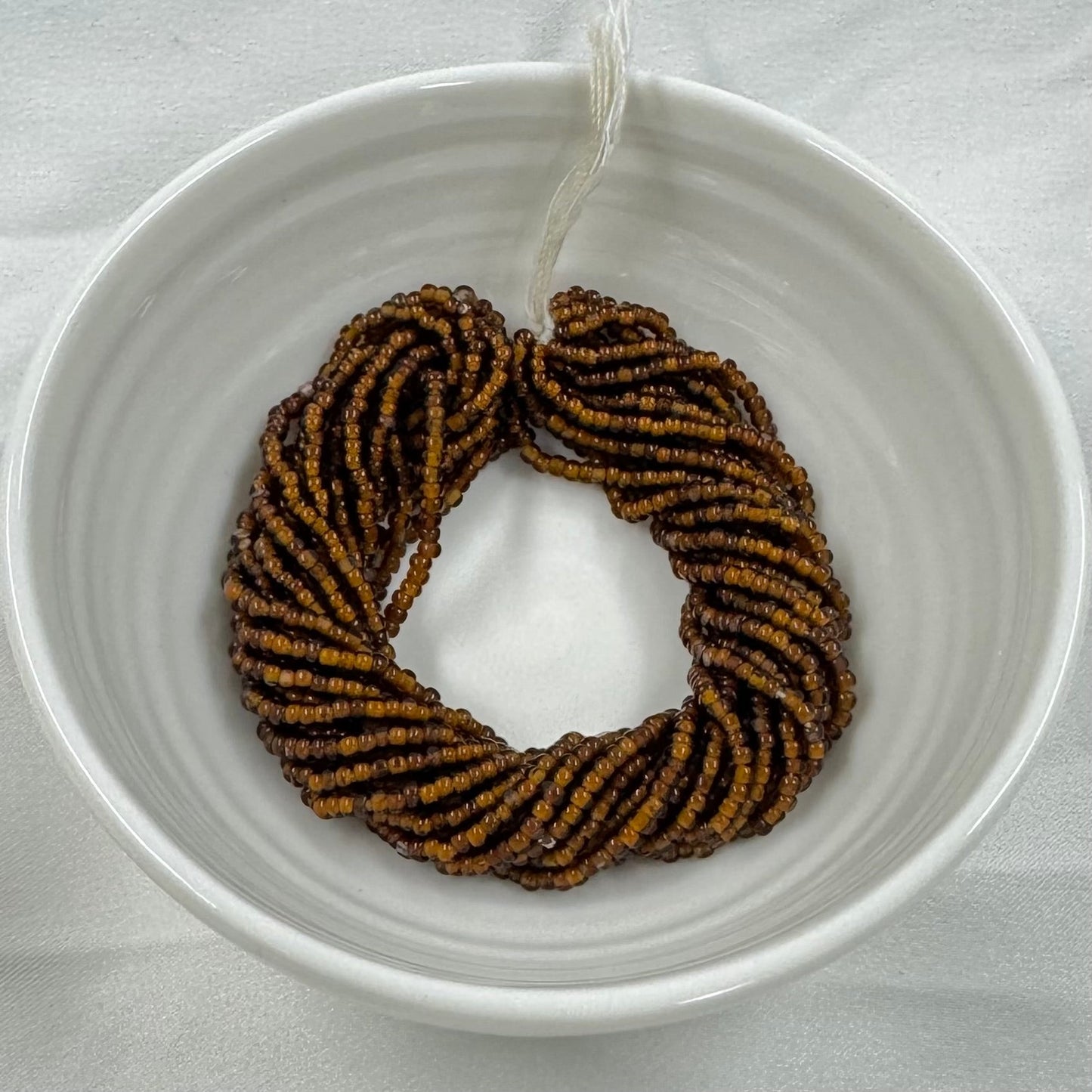 11/0 Charlotte Cut Seed Bead- Green - Neon Orange Lined (Brown) *10g Hank* India Sheen Charlotte Cut Seedbeads