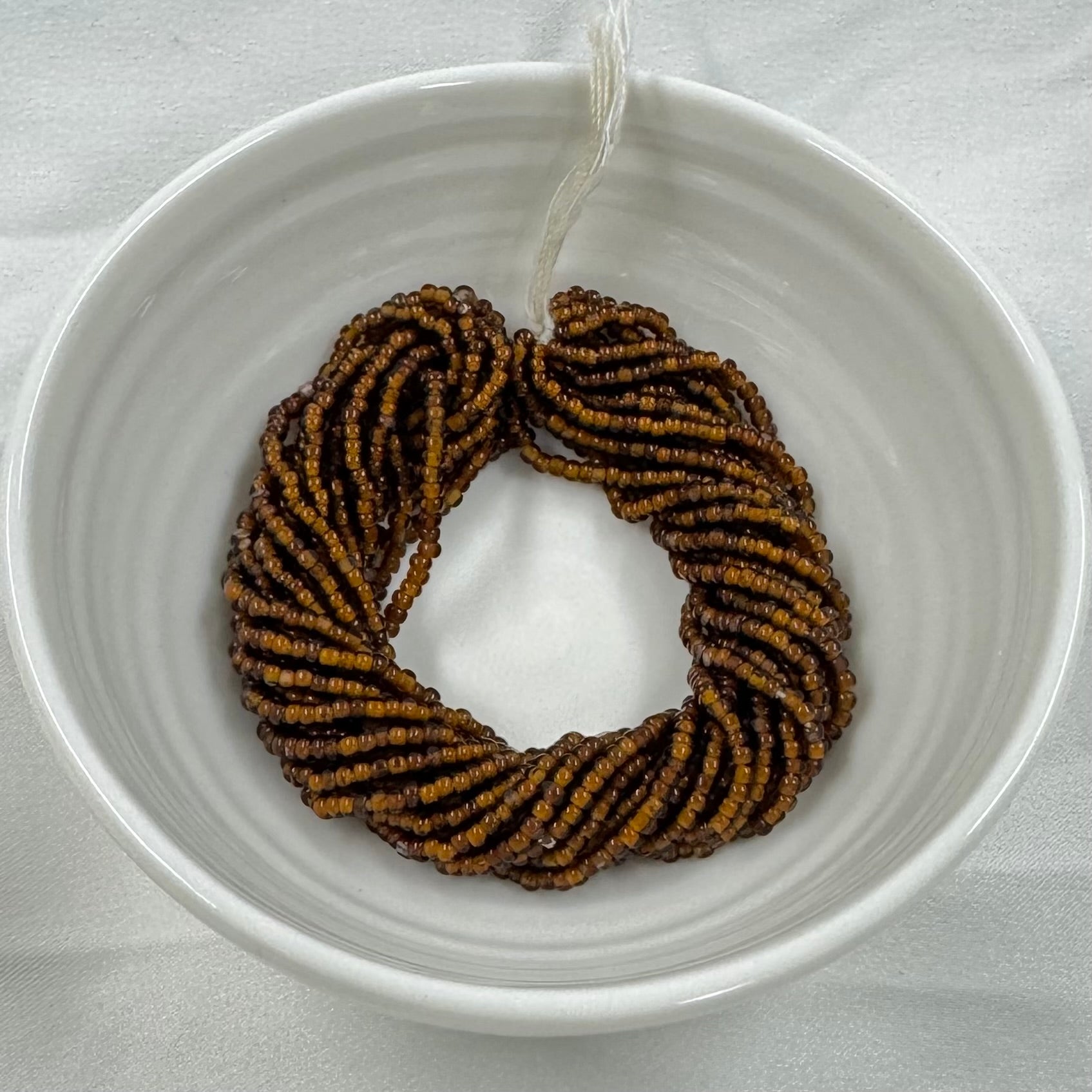 11/0 Charlotte Cut Seed Bead- Green - Neon Orange Lined (Brown) *10g Hank* India Sheen Charlotte Cut Seedbeads