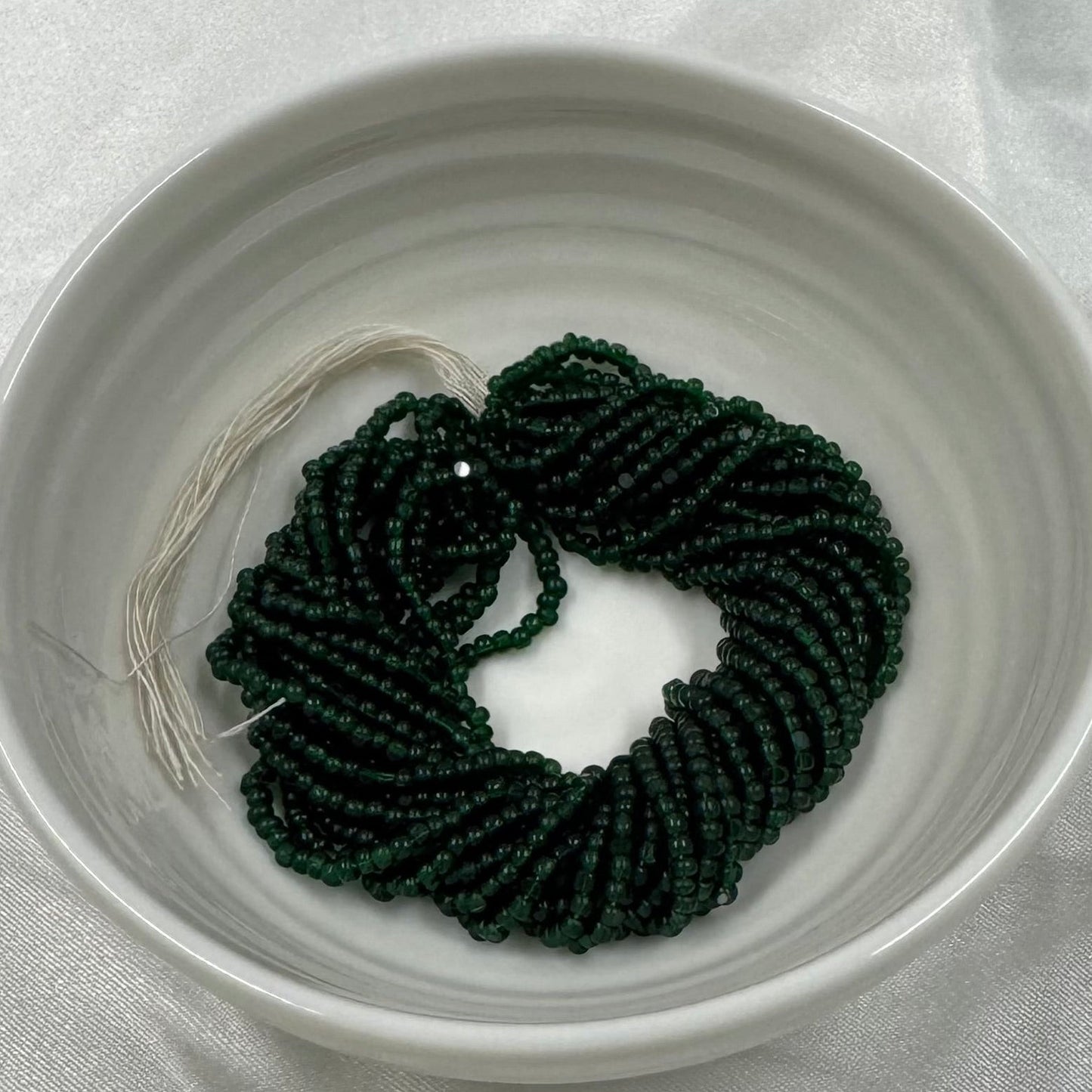 11/0 Charlotte Cut Seed Bead - Forrest Green Transparent 10g India Sheen Charlotte Cut Seedbeads