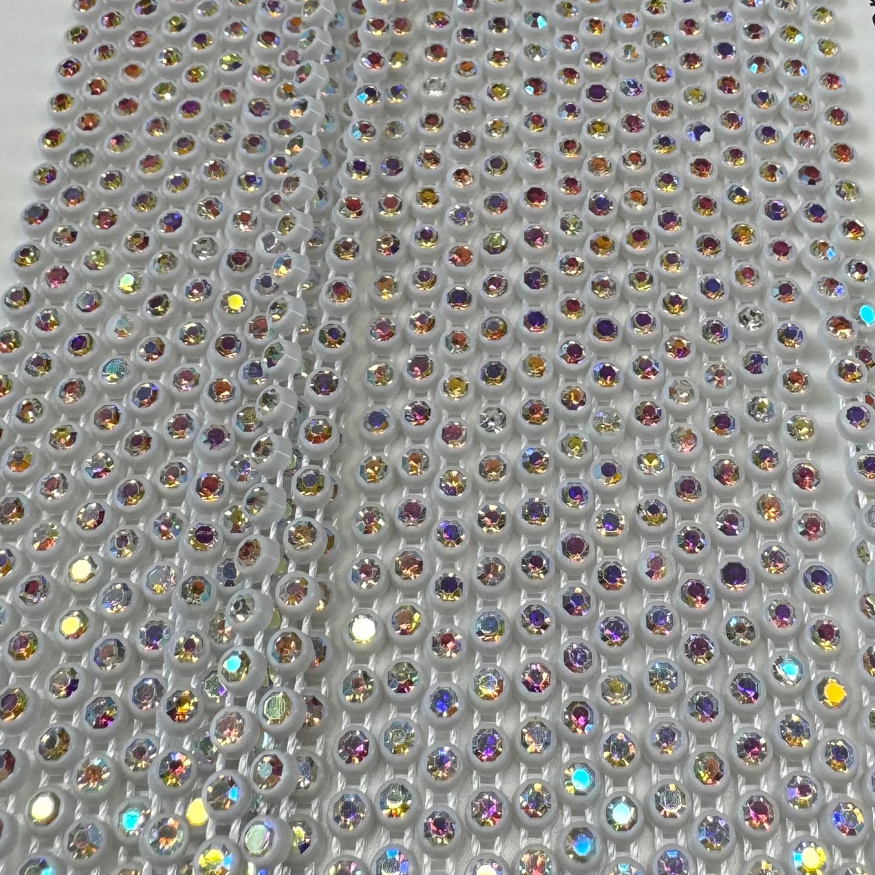 Ss8 AB on WHITE Plastic Rhinestone Banding, Crystal Lane Brand, Sold by yard Plastic Rhinestone Chain