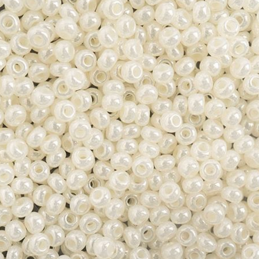 Close-up of small white beads