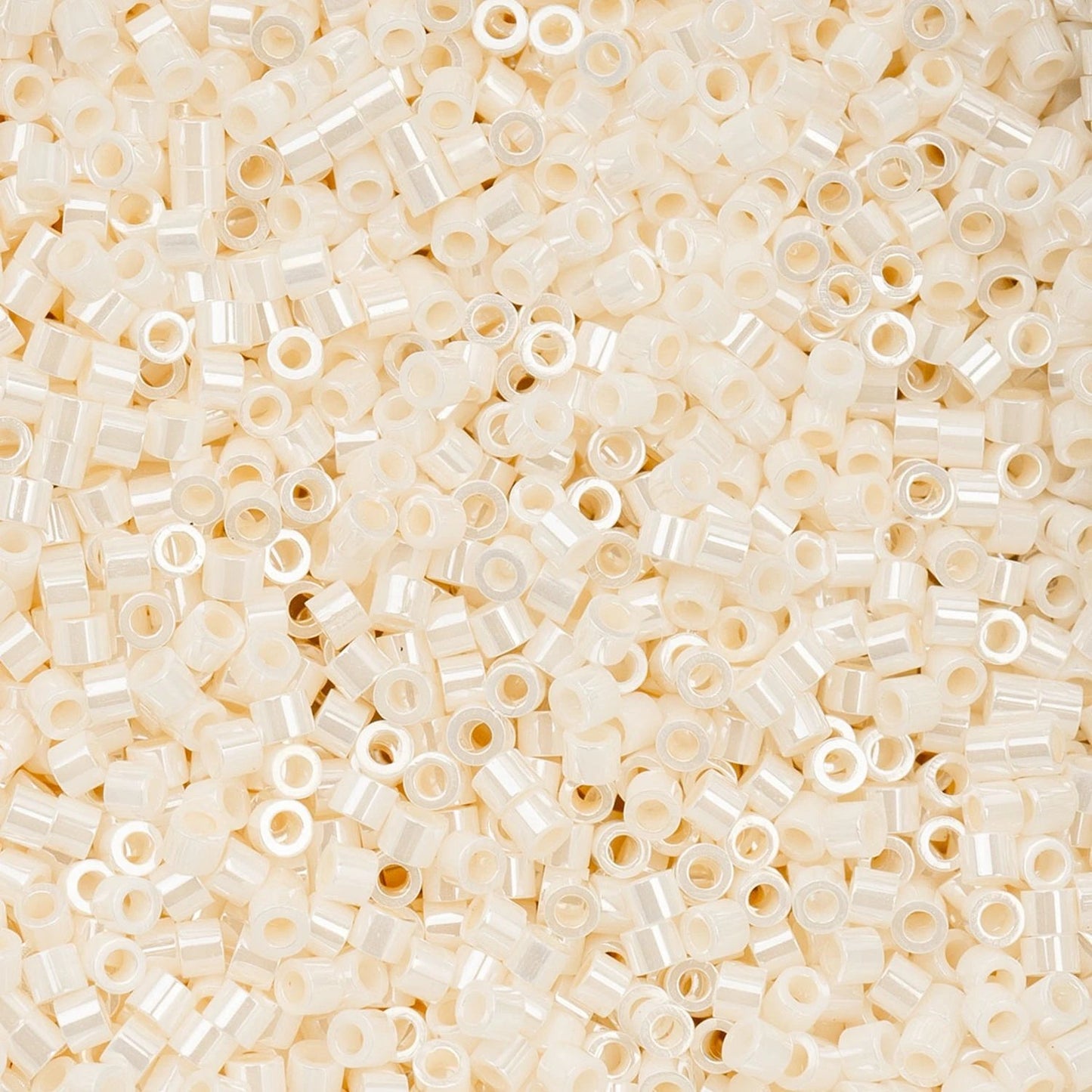 Cylin Bead 11/0 25g Bag – Opaque White Bisque Ceylon 697CY11-1093 Cylin Beads John Beads