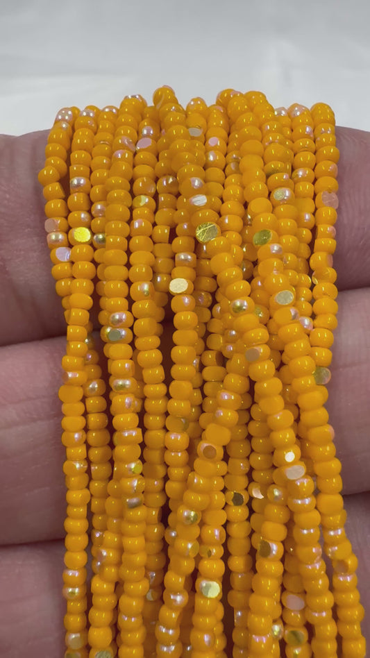 11/0 Charlotte Cut *Premium Seed Bead- Opaque Patina Light Orange Aurore Boreale  (AB) *10g Hank*
