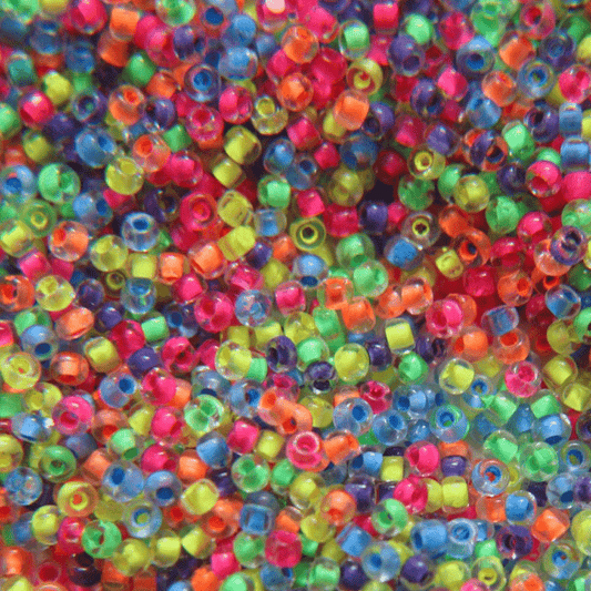 Neon colors give all the vibes! SuperDuo seed beads made with WildFire  Beading Thread. #neon #neonparty #neonvibes #handmadejewelry…