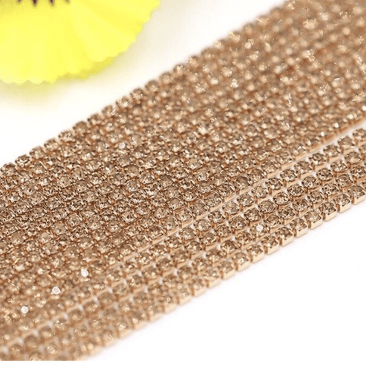 Sundaylace Creations & Bling SS6 Metal Rhinestone Chain SS10 Peach-Champagne on Champagne coloured metal rhinestone, Dense Metal Rhinestone Chain, Sold per yard