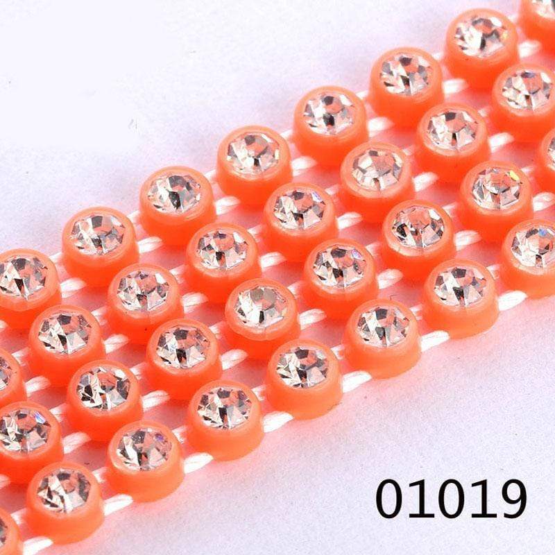 Sundaylace Creations & Bling Ss6 Plastic Rhinestone Banding Rope Neon Orange Ss6 Plastic Rhinestone Banding Chain Rope, CLEAR cut on various colours, Sold in yard