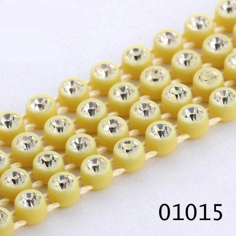 Sundaylace Creations & Bling Ss6 Plastic Rhinestone Banding Rope Butter Yellow Ss6 Plastic Rhinestone Banding Chain Rope, CLEAR cut on various colours, Sold in yard