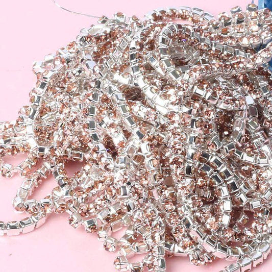 Sundaylace Creations & Bling SS6 Metal Rhinestone Chain Ss6 Silver Ss6 & Ss8 Metal Rhinestone Chain: Silk Champagne, Sold by yard